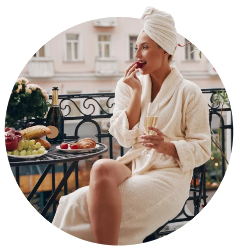 Guest enjoying breakfast on balcony